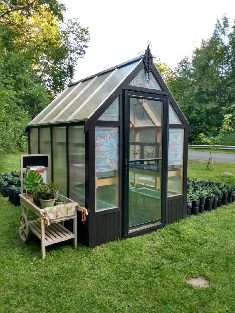 A frame greenhouse with black finish