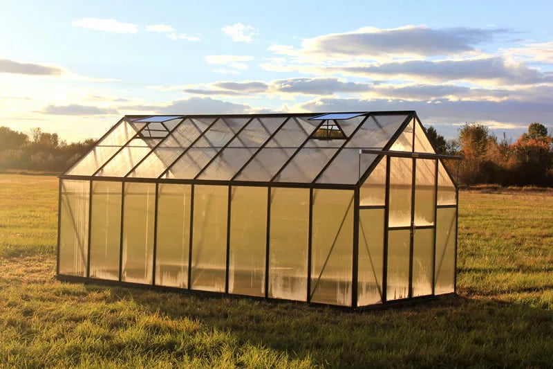 Side view of the spacious Grandio Ascent 8x16 greenhouse with robust framing and insulation, suitable for all-season gardening