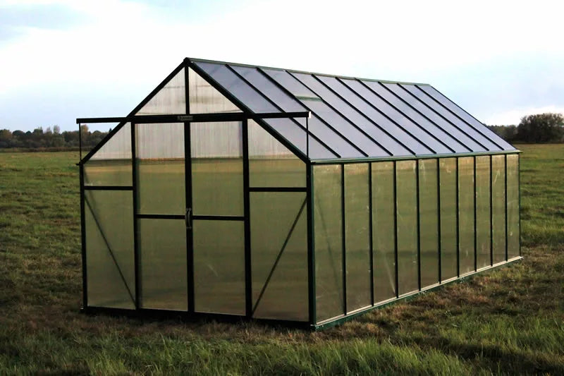 Corner view of a large Grandio Ascent 8x20 greenhouse, highlighting its sturdy build and ample interior space for sustainable gardening.