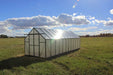 Corner angle of the Grandio Ascent 8x24 greenhouse showcasing its durable construction and ample growing space for plants.