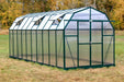 Corner view of a premium 8x20 Grandio Elite greenhouse set in a natural environment, blending size and style for serious gardeners.