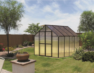 Mont greenhouse in black placed in backyard oasis.